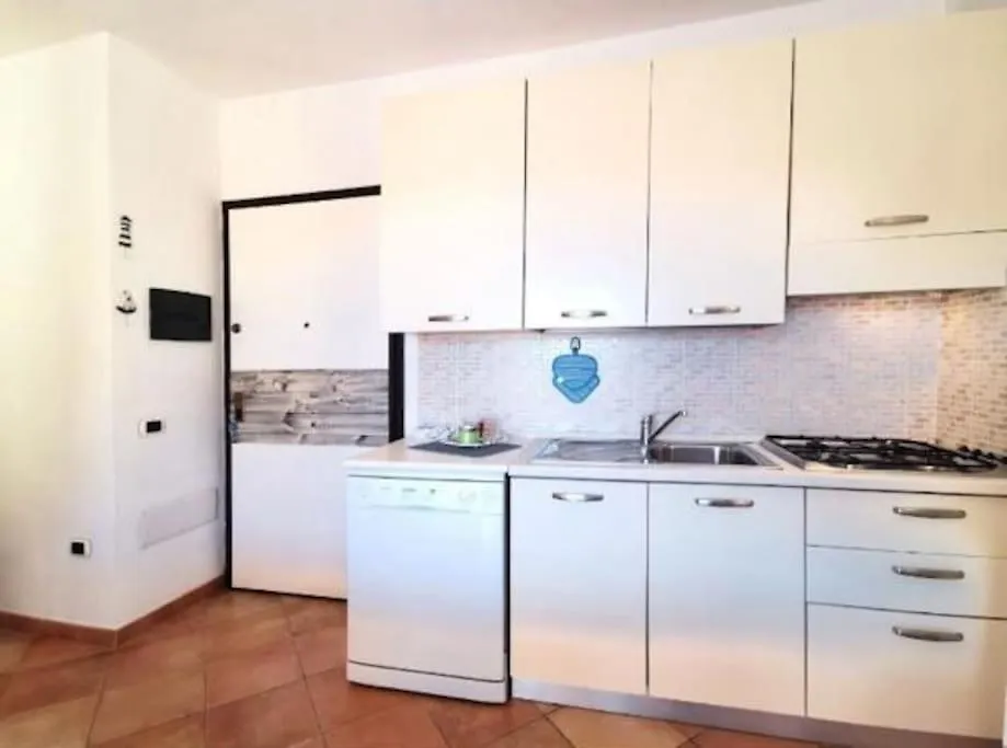 アパート Residence Dei Fiori Con Piscina サンタ・テレーザ・ガッルーラ イタリア